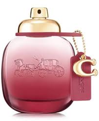 Coach perfume bottle with pink and gold design